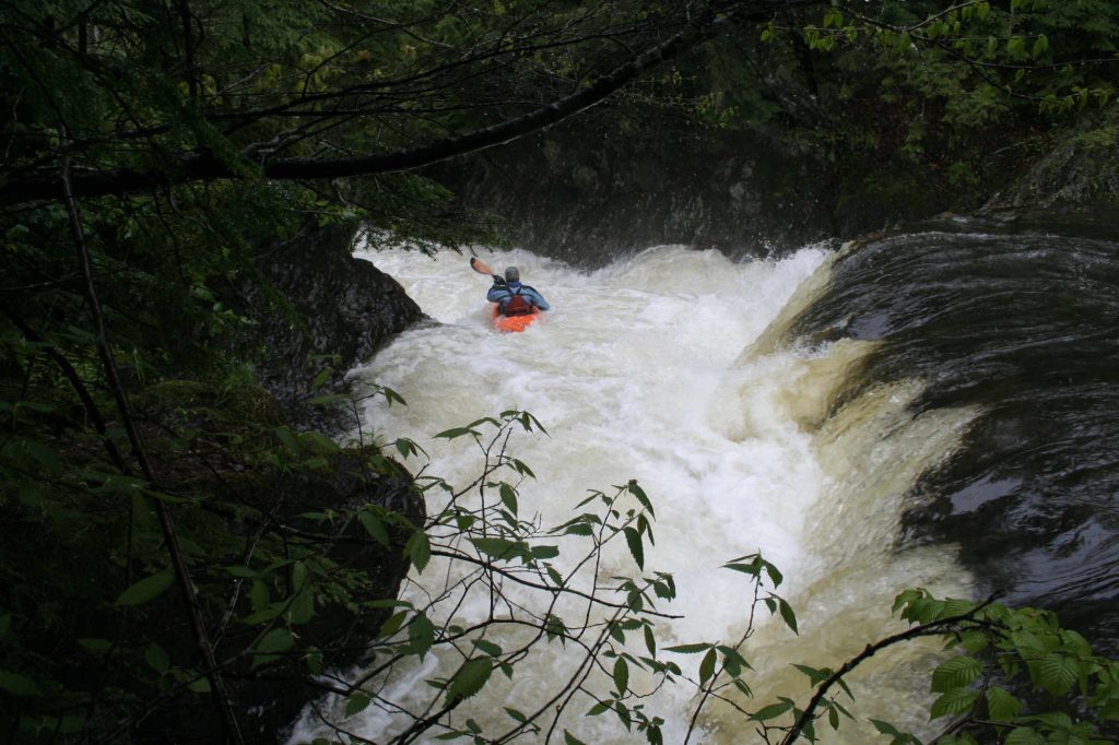 Simone Orlandi runs Bedhead on the Gihon River Vermont Whitewater Kayaking