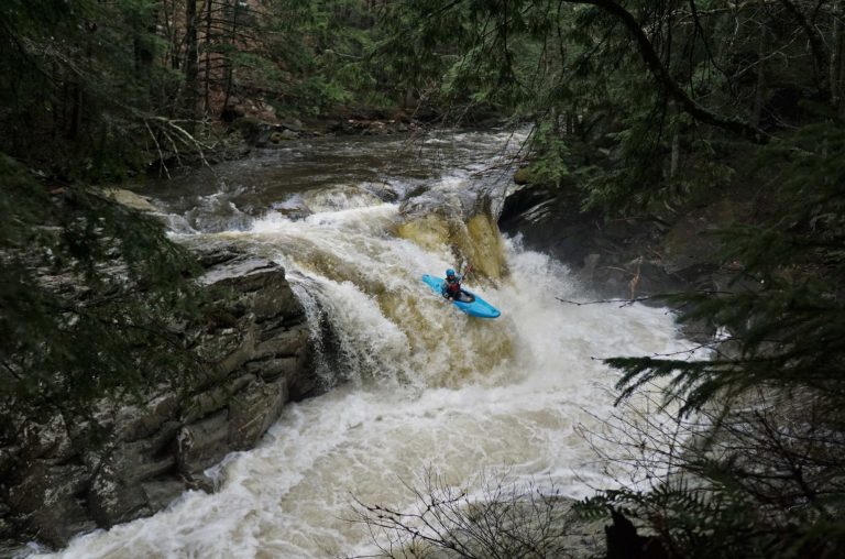 Jordan Vickers runs a waterfall on the New Haven River Vermont Whitewater Kayaking