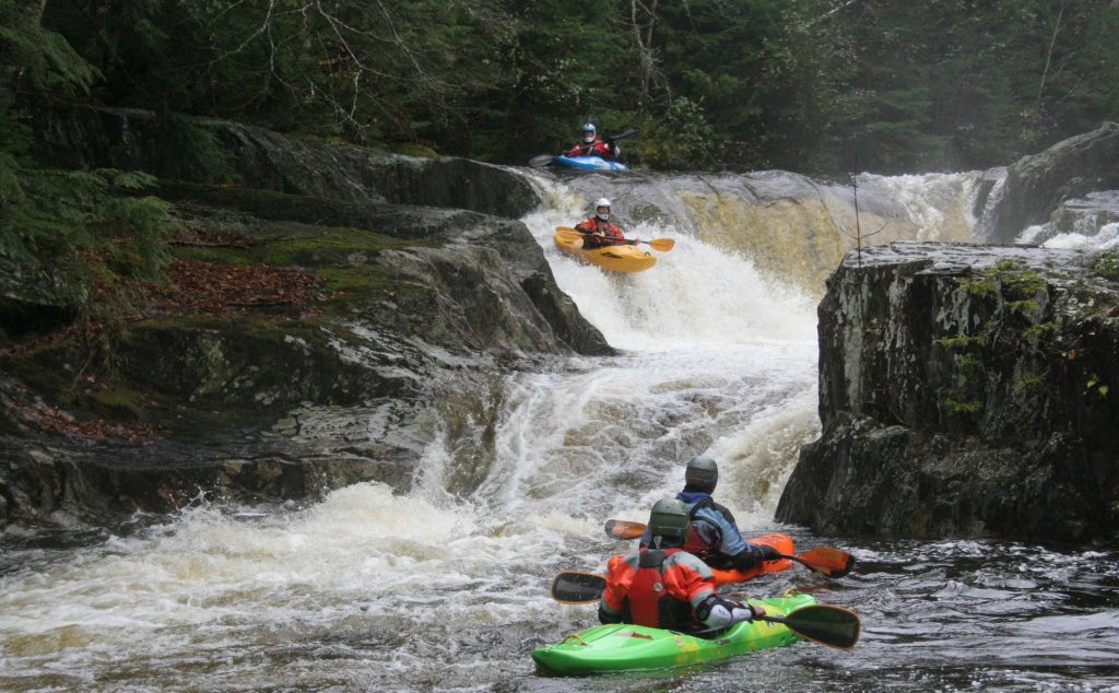 Kayakers on a waterfall on the North Branch of the Winooski Vermont Whitewater Kayaking