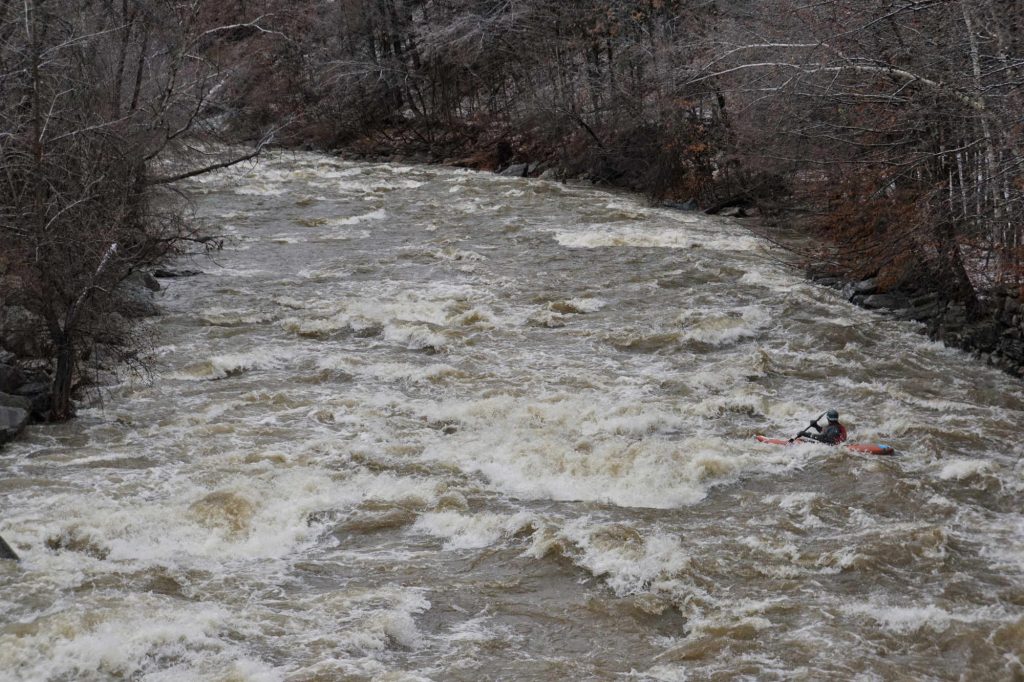 Mike Mainer runs a rapid on the lower New Haven River Bristol Vermont Whitewater Kayaking