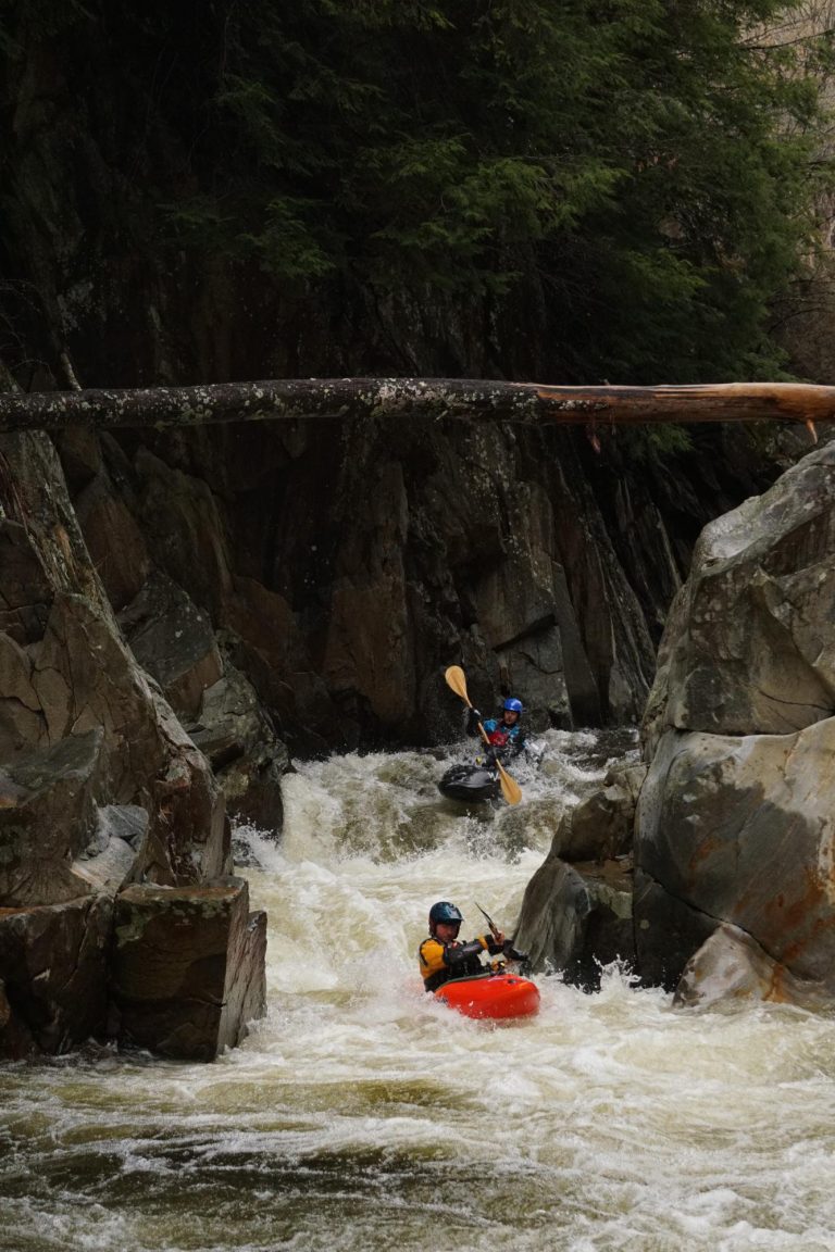 Taylor Ratcliffe and Chris Margo head into the Clarendon Gorge of the Mill River Vermont Whitewater Kayaking