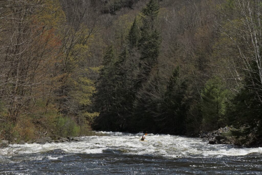 Clay Murphy in the first rapid on the West River dam release 2022 Vermont whitewater kayaking