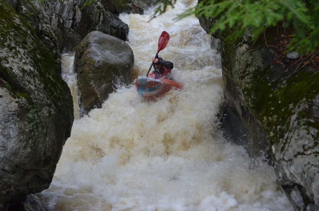 Jordan Vickers runs a rapid on Joiner Brook Bolton Vermont Whitewater Kayaking