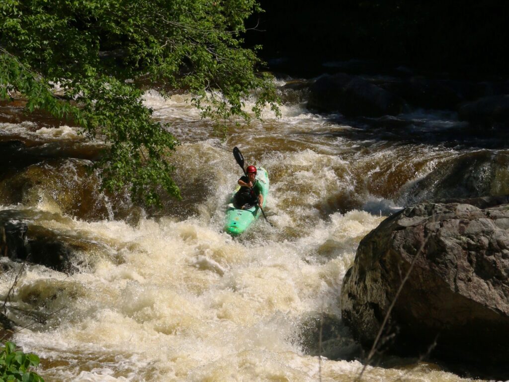 Will S runs roadside slide rapid on the New Haven River Bristol Vermont whitewater kayaking