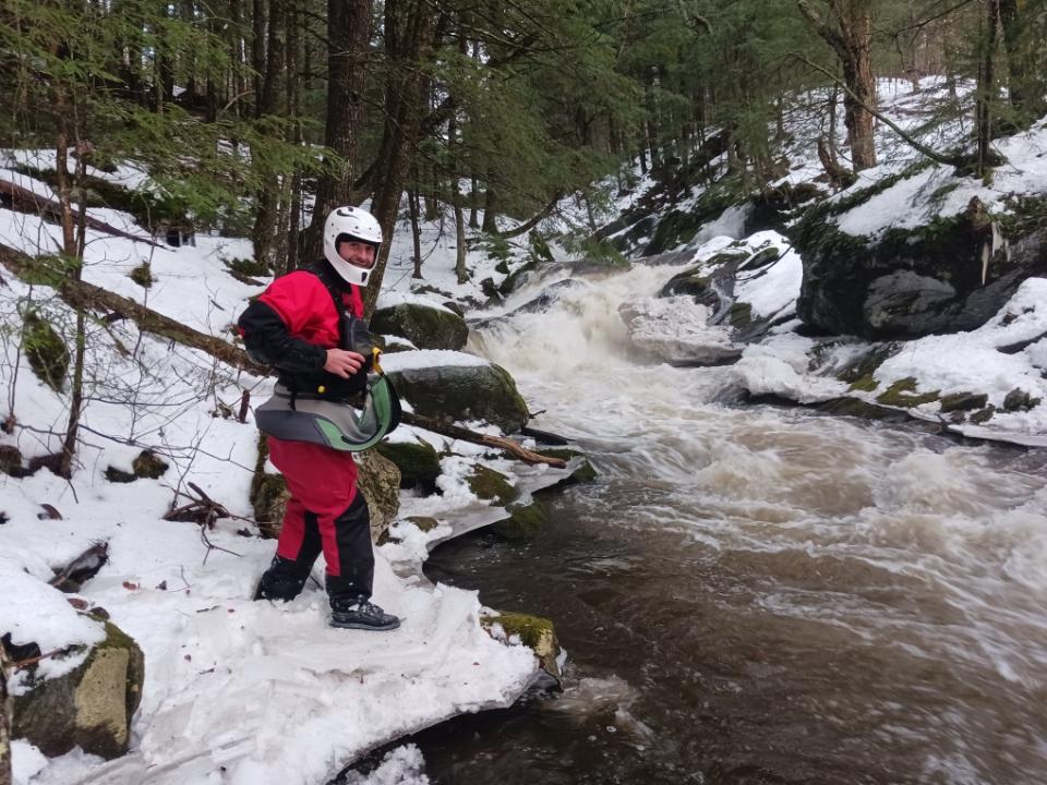 Corey Thibodeau geared up and looking excited to check out Basin Brook near Belvidere Vermont whitewater kayaking