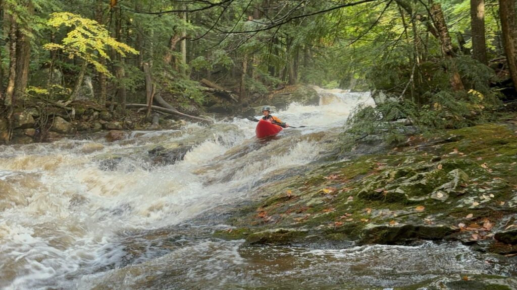 Mike Mainer kayaks a rapid on Bristol Notch Brook near Bristol, VT